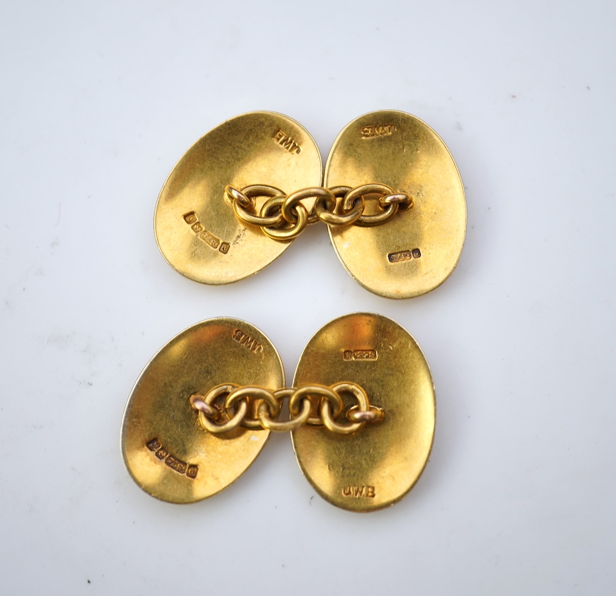 A pair of 9ct gold and enamel cufflinks, circa 1966